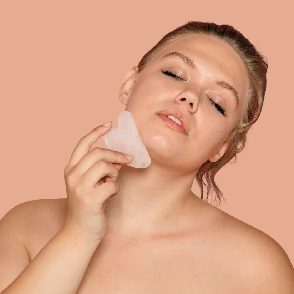 Gua sha en quartz rose