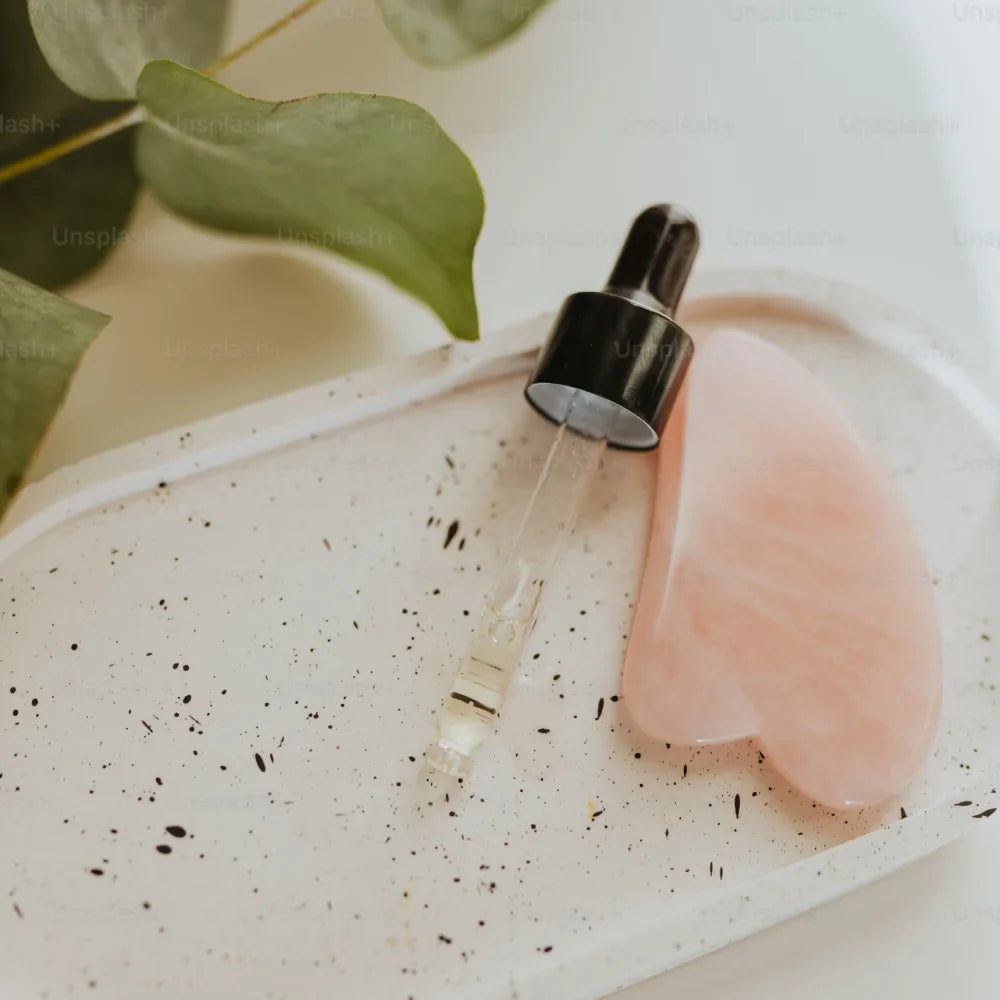 Gua sha en quartz rose
