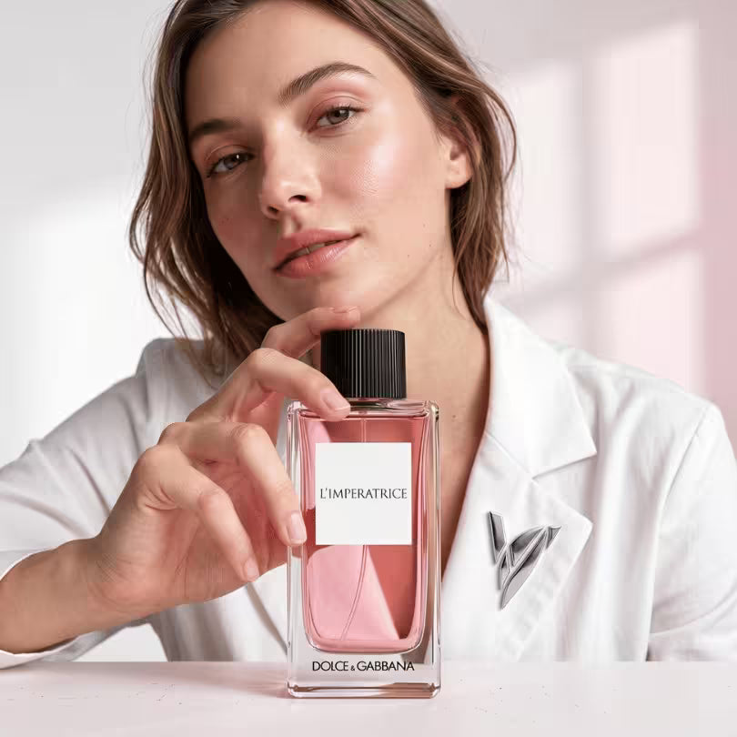 Model holding Dolce & Gabbana L'Imperatrice Eau de Toilette perfume