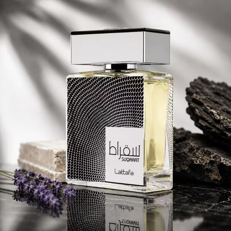 Lattafa Suqraat Eau de Parfum 100ml luxury lifestyle perfume with lavender and stone background
